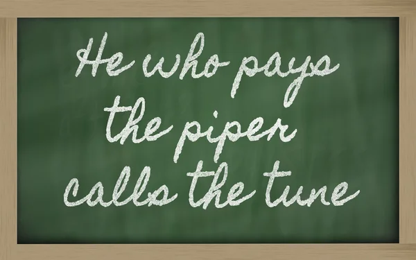 Expression - He who pays the piper calls the tune - written on — Stock Photo, Image