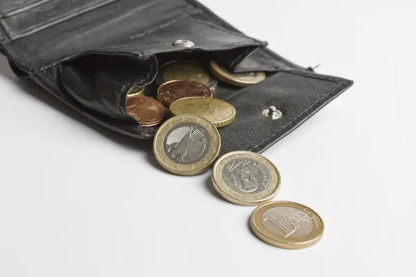 Lös pengar faller ur plånbok — Stockfoto