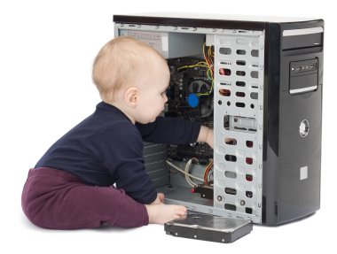 Young child with open computer clipart