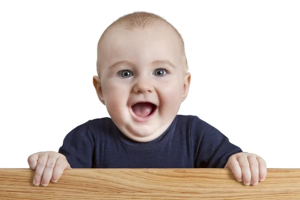 Bambino in possesso di tavola di legno — Foto Stock