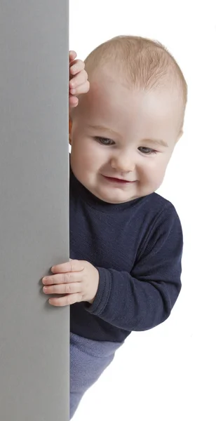 Criança jovem segurando sinal vertical — Fotografia de Stock