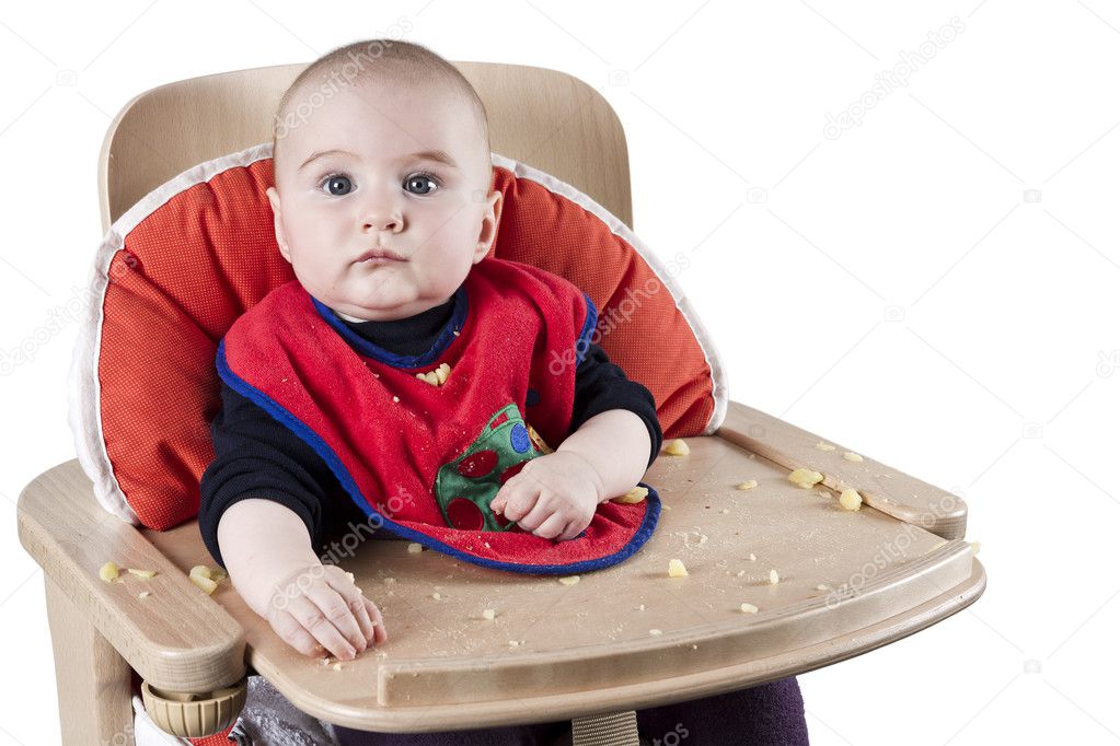 Toddler eating potatoes