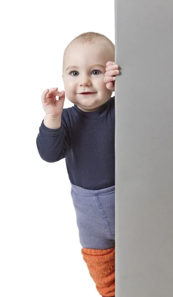 Bambino che tiene il segno verticale — Foto Stock