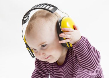 Young child with ear protector clipart