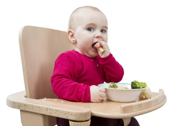 年轻的孩子吃的高脚椅 — 图库照片