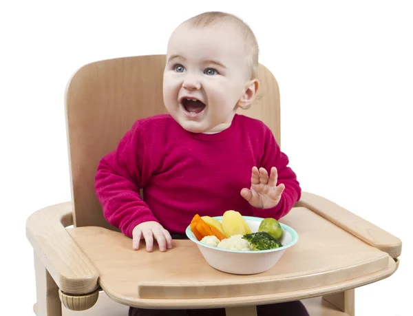 Μικρό παιδί που τρώει στο καρεκλάκι — Φωτογραφία Αρχείου