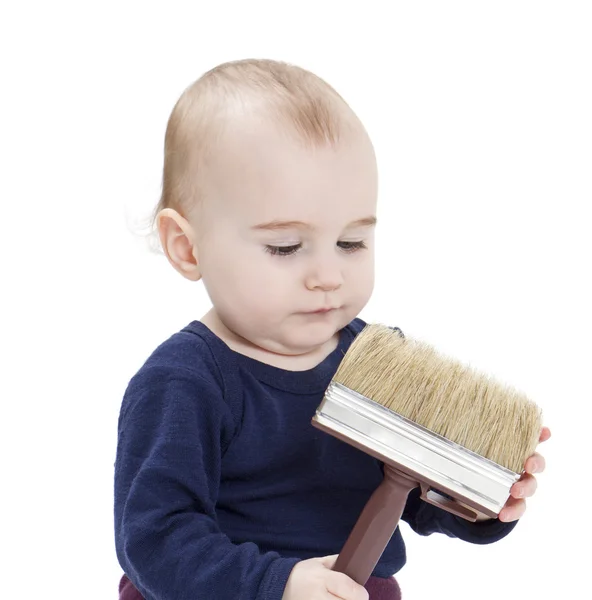 Criança pequena com escova — Fotografia de Stock