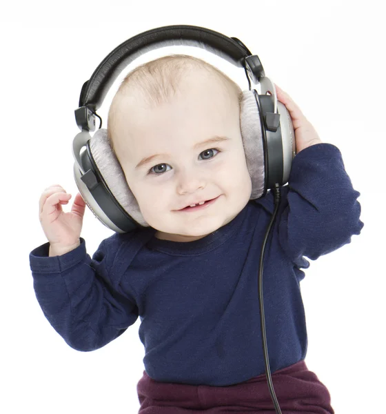 Fiatal gyermek fül-telefon zene hallgatása — Stock Fotó
