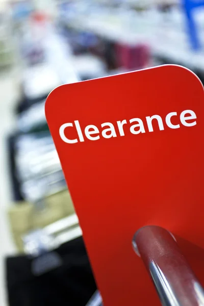 stock image Sale Clearance Sign On Rail in Clothes Shop