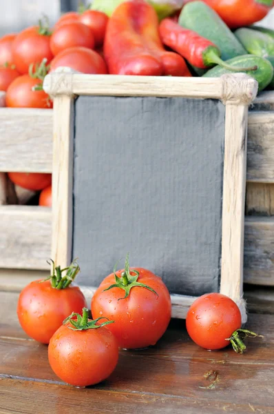 Tomatoes and price — Stock Photo, Image