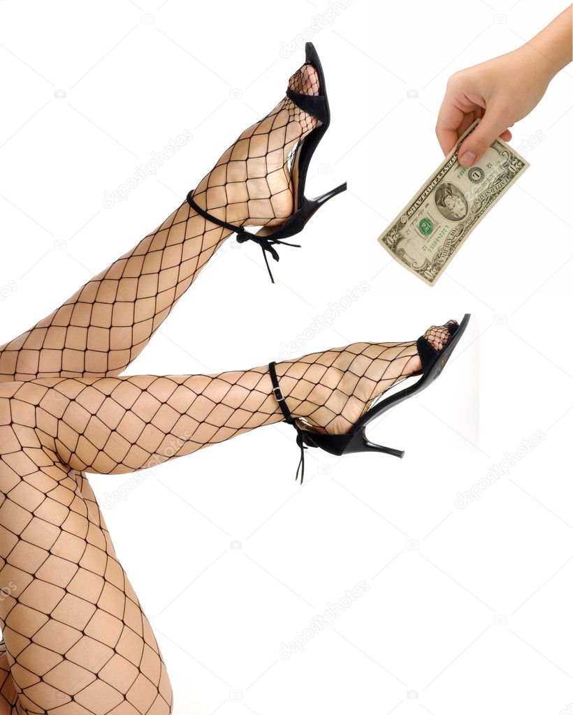 Hand with twenty dollars paying for sexual service