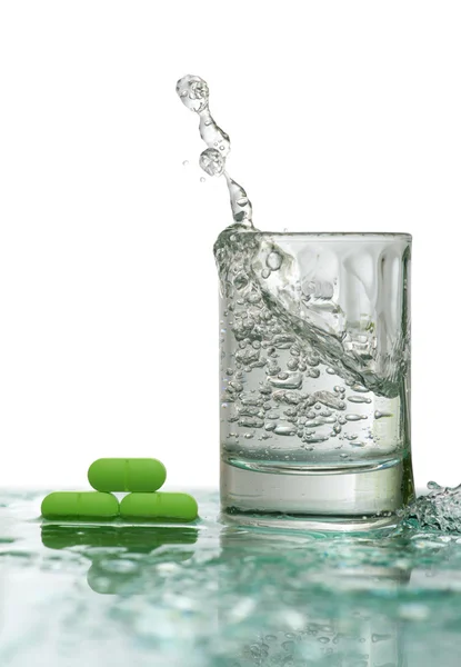 stock image Tablets and glass of water