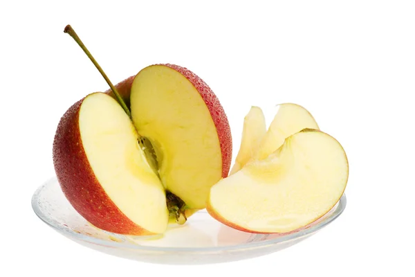 Jabłko świeże owoce z plasterków i woda spada na talerzu. Isola Zdjęcie Stockowe