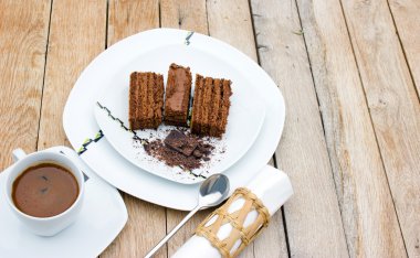 Chocolate cake and cup of coffee