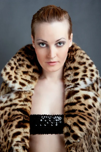Attractive woman in fur coat — Stock Photo, Image
