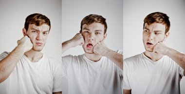 Portrait of a man beats his fist