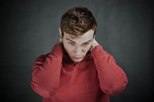 Portrait of young man thinking — Stock Photo, Image