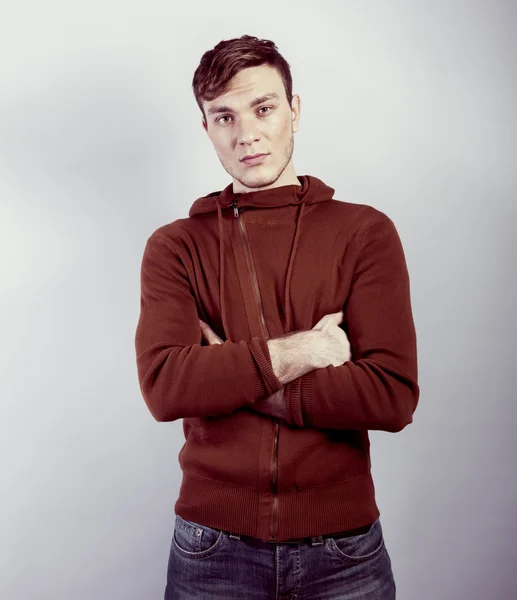 Fashion portrait of the young beautiful man in studio — Stok fotoğraf