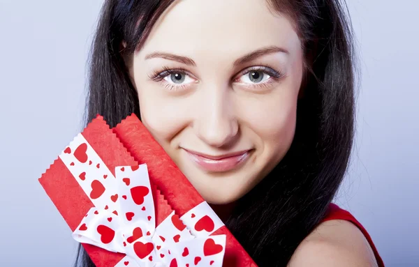 Beautiful woman with present — Stock Photo, Image