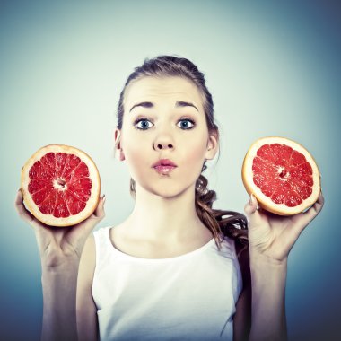 Portrait of young crazy woman with grapefruit clipart