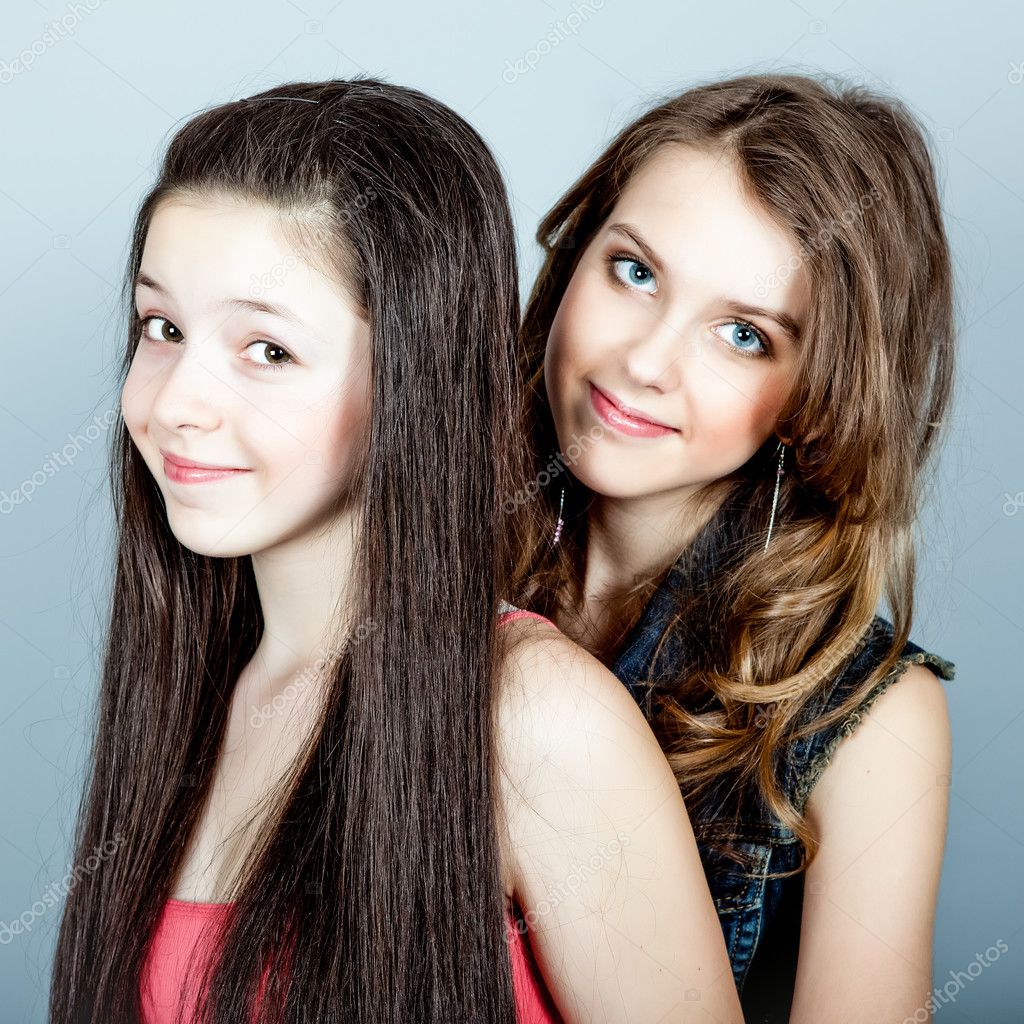 Two happy young girlfriends � Stock Photo � Porechenskaya #9771290