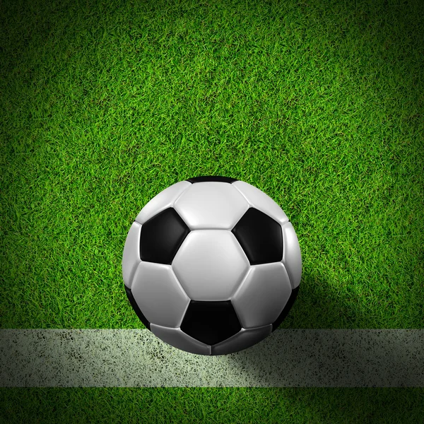 Футбол (футбольний м'яч) у трав'яному полі . — стокове фото