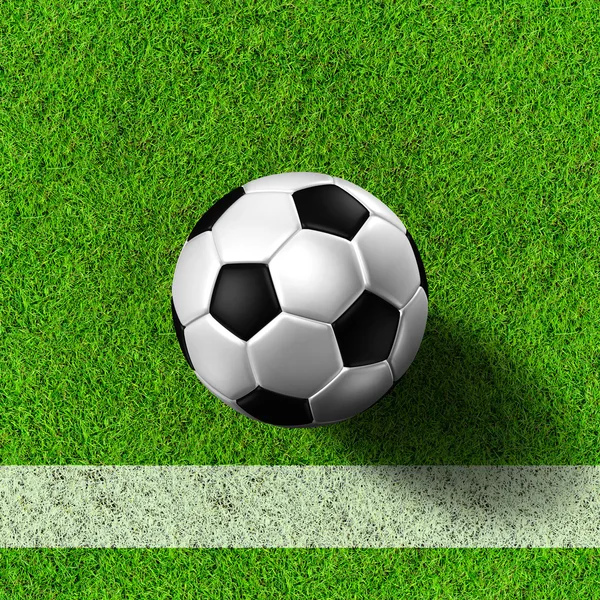 Футбол (футбольний м'яч) у трав'яному полі . — стокове фото