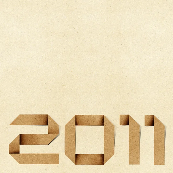 С Новым 2011 годом Recycled Paper Craft Background . — стоковое фото