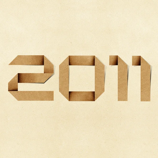 Felice anno nuovo 2011 riciclato sfondo mestiere di carta . — Foto Stock