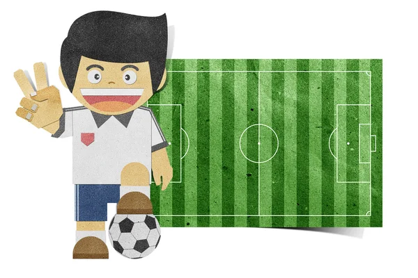 Papper pojke (fotbollsplan) återvunnet papper hantverk på vita bac — Stockfoto