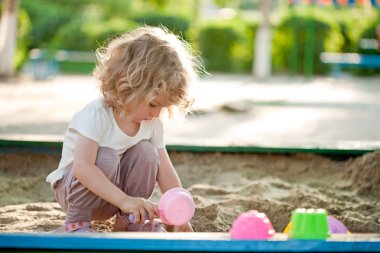 Child on playground clipart