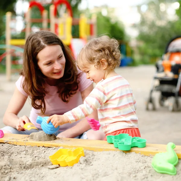 Family on playground — Stock Photo, Image