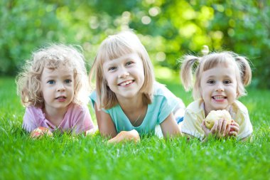 Happy child in spring park clipart