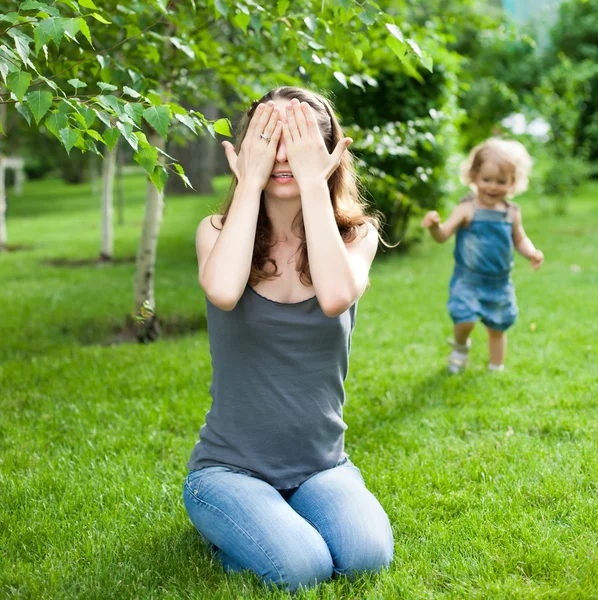 Woman and child playing — Stock Photo, Image