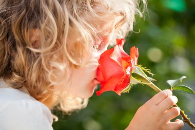 Child with flower clipart