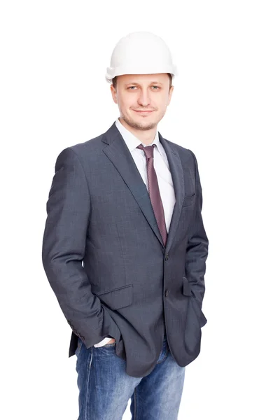 Engineer with white hard hat standing confidently isolated on wh — Stock Photo, Image