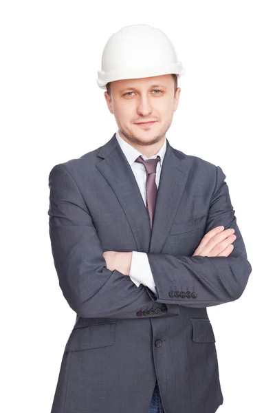 Ingenieur mit weißem Bollenhut steht selbstbewusst isoliert auf dem Podium — Stockfoto