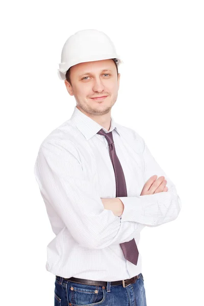 Інженер з білим твердим капелюхом, що стоїть впевнено ізольовано на — стокове фото
