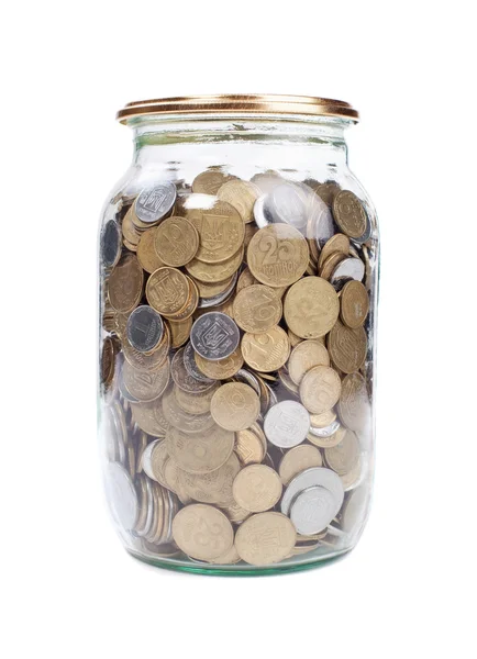 Coins in the jar on white background — Stock Photo, Image