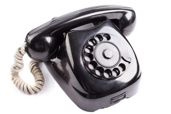 Oude zwarte telefoon op witte achtergrond — Stockfoto