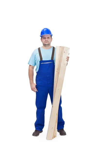 Ouvrier de la construction avec plancks en bois — Photo