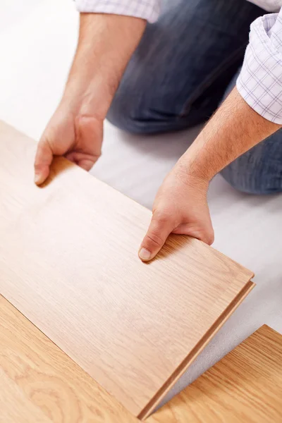 Home improvement - installing laminate flooring — Stock Photo, Image