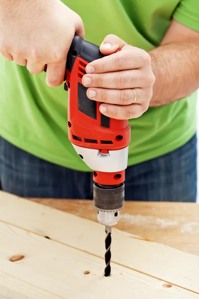 Carpintero o carpintero agujero de perforación — Foto de Stock