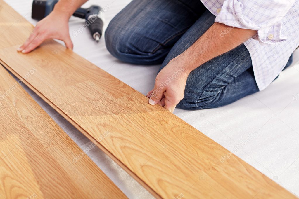 Installing Laminate Flooring — Stock Photo © Lightkeeper 8542131