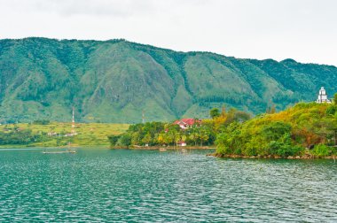 Village on Lake Toba in Sumatra clipart