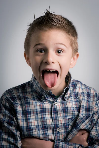 Kid tongue out — Stock Photo, Image