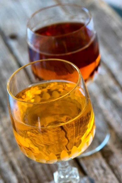 Apricot liqueur and bitter — Stock Photo, Image