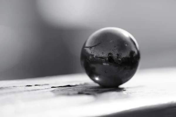 stock image Dark marble on the fence