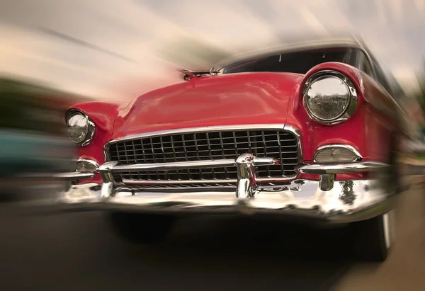 Красный автомобиль в движении — стоковое фото
