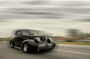 Fast moving vintage car clipart